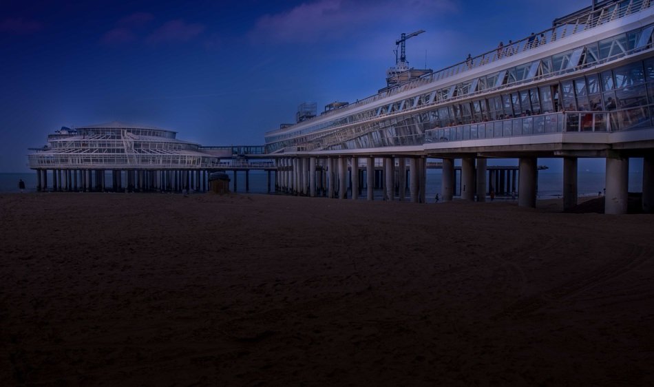 pier on the beach in holland at night