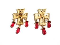 gold cross shaped earrings with red stones