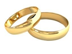 gold bridal rings on a white background