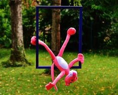 soft pink panther on the picture frame