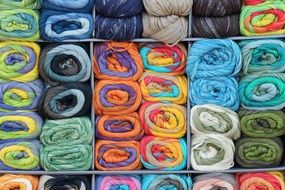 lot of multi-colored wool for knitting