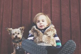 happy child with a puppy