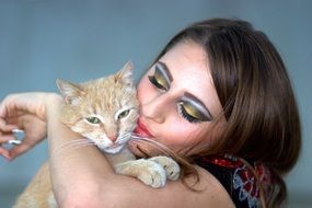 portrait of a woman with red cat