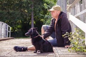 wet dog with his owner