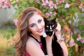 pretty woman with black cat