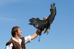 Falconer with the falcon