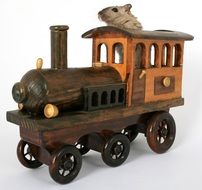 mouse in a wooden toytrain