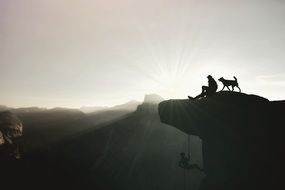 mountaineer with a dog
