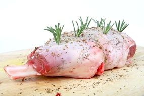 beef on the bone with green leaves