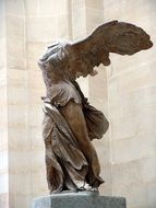 statue of a woman with wings