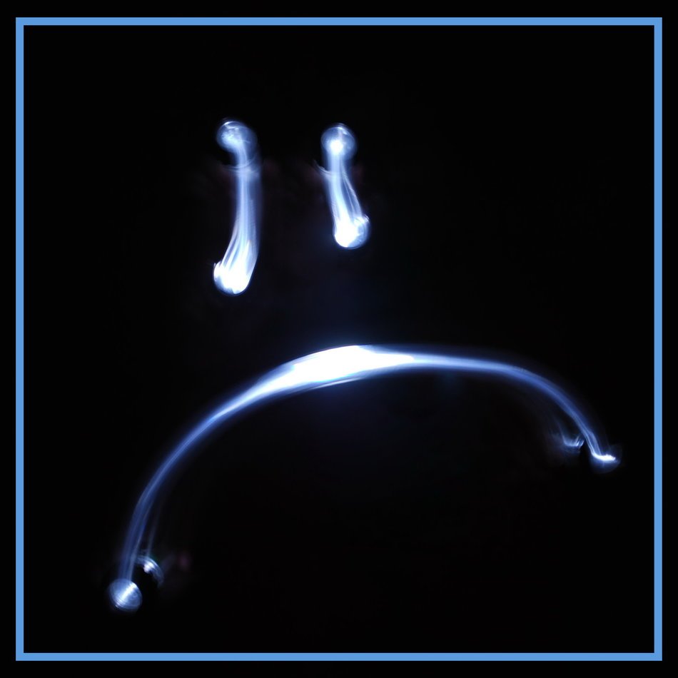 sad animation on a black background