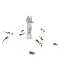child surrounded by a lot of frogs