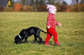 Child and small Dog