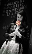 young woman with lollipop, monochrome