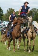 horsemanship, young men riding two horses