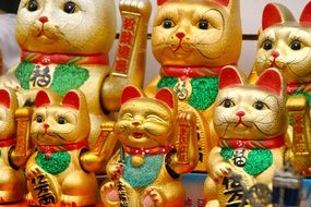 golden cats like lucky charm in japan
