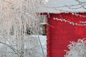 red hut among the snowy landscape