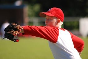 boy with a glove in baseball