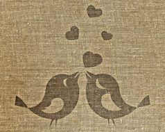 drawing of a pair of birds on the fabric