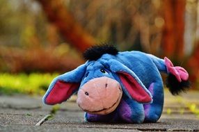 soft toy of blue color in the form of a donkey