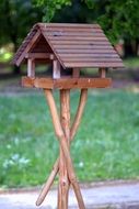 wooden bird feeder as a work of art