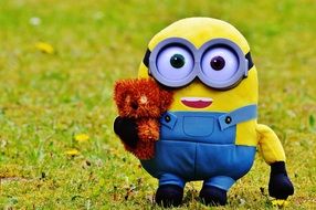 photo of minion with a toy in his hand