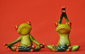 two stone frog doing yoga on the floor