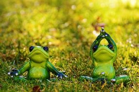 ceramic frogs practicing yoga