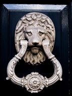 Door knocker in form of lion