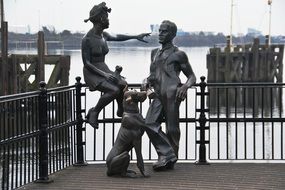 Statues of the people and the dog