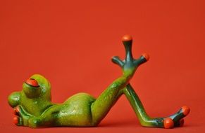 frog resting on the floor