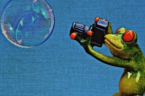 fabric picture with a frog taking pictures of a soap bubble