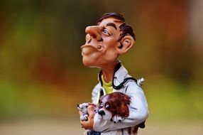 funny figure of veterinarian with pets