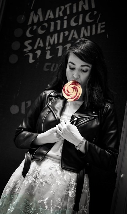 young woman with lollipop, monochrome