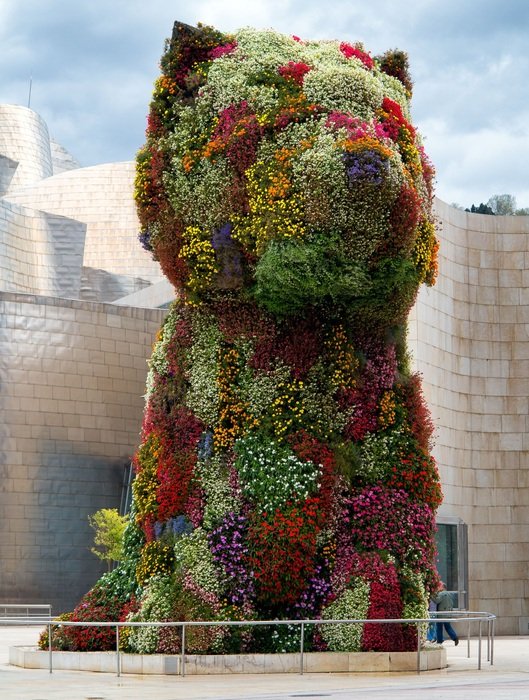 photo of the dog landmark made of flowers