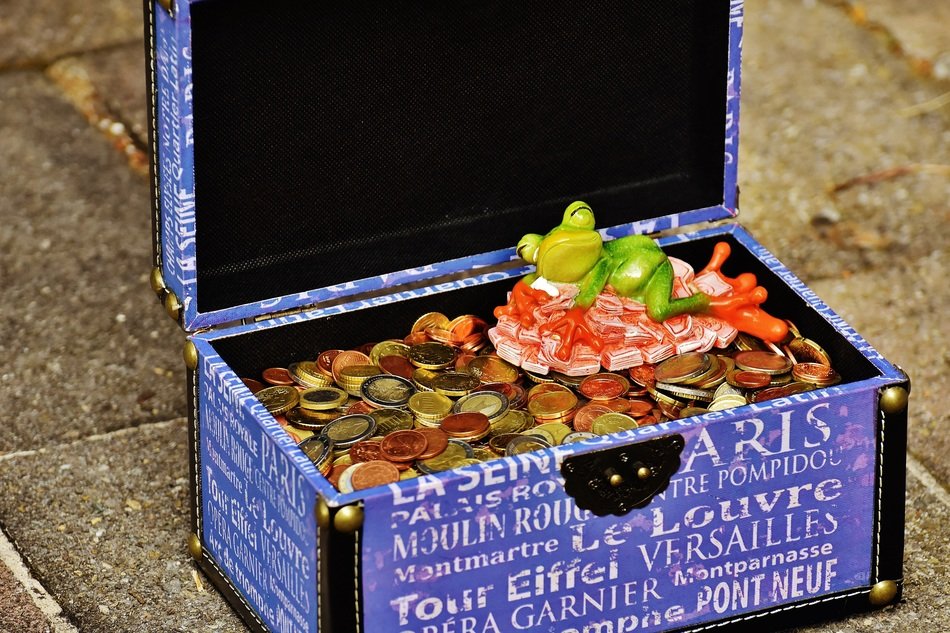 statuette of frog in the treasure chest