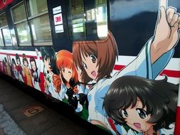 drawing anime on a train in Tokyo