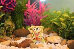 Colorful Spongebob Underwater among the colorful plants