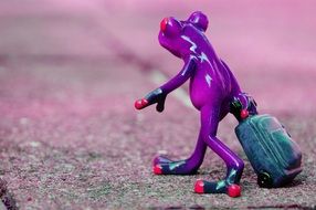 cute frog with luggage