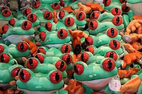 ceramic frogs on the shelf in the store