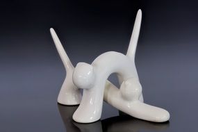 white ceramic figure