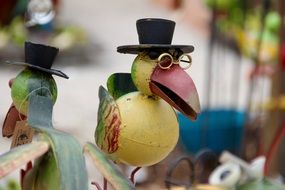 Close up photo of colorful wooden bird decoration