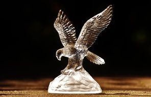 a bird of prey from a glass