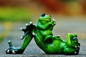 figure of a frog with a cub
