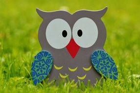 wooden garden decor in figure of an owl