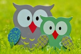 wooden figures of owls