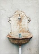 old washbasin on the wall