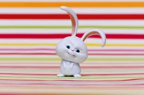 evil bunny on a background of colored bands