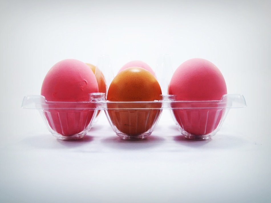 closeup picture of colorful Easter eggs in the box