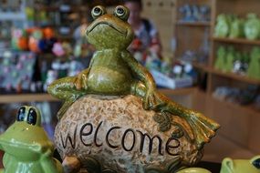 Frog Fig on stone, Welcome, Garden sculpture